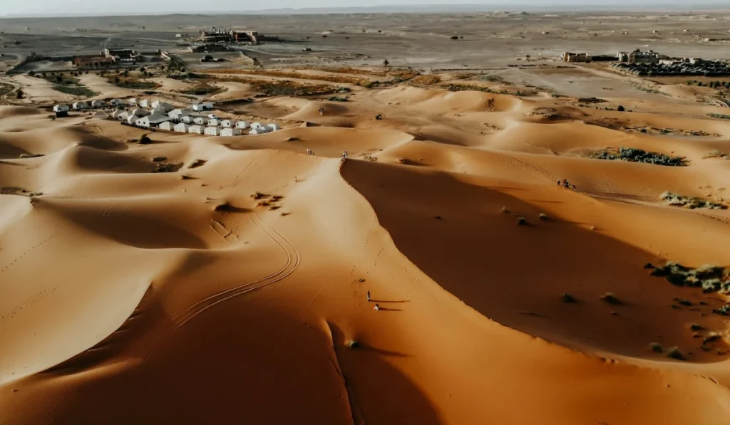Sand dunes and camp tents in the Merzouga desert in Morocco